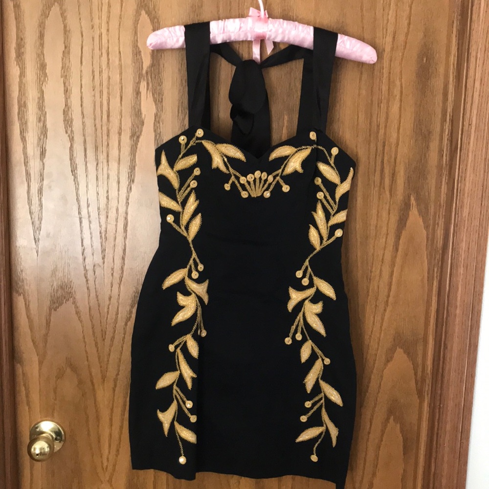Free People black mini dress- Very Unique!